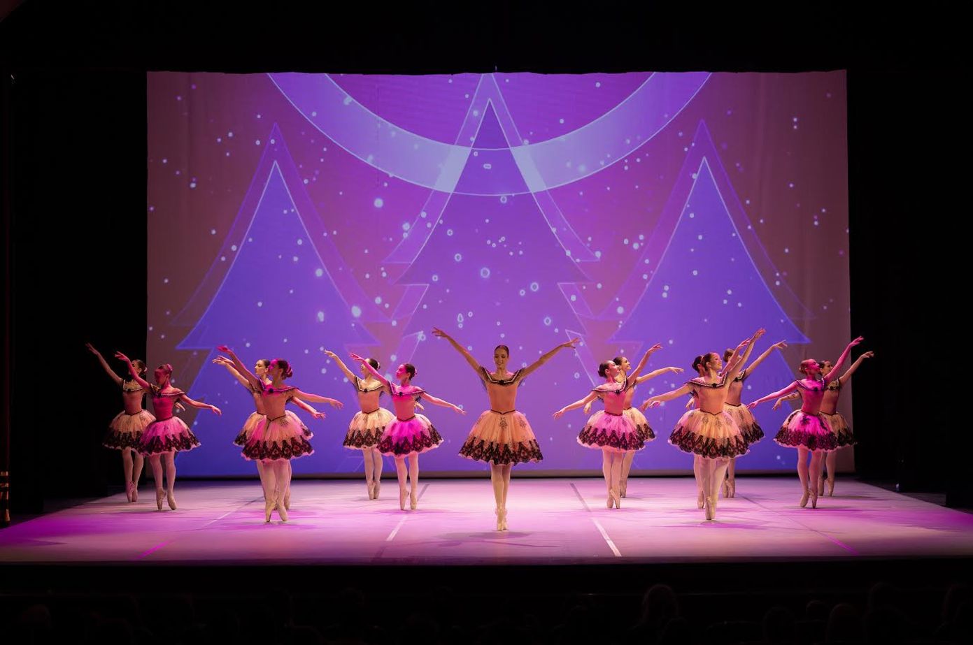 Buse center stage leading the full corps de ballet